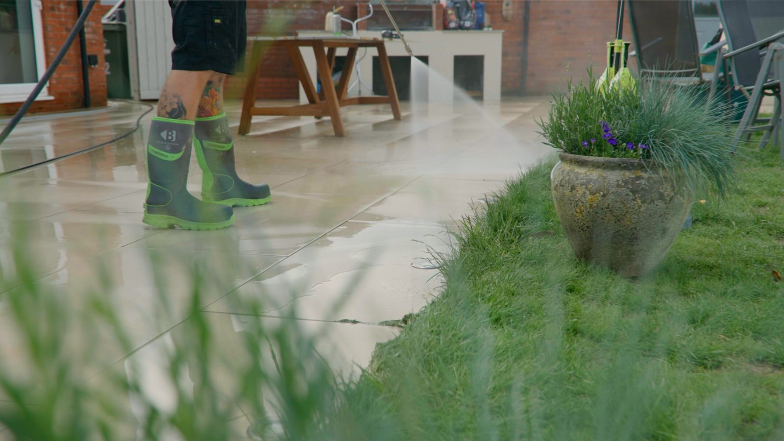 SAS Exterior Cleaning: Explaining Their Pressure Washing Service convergence films man working fimmaking garden